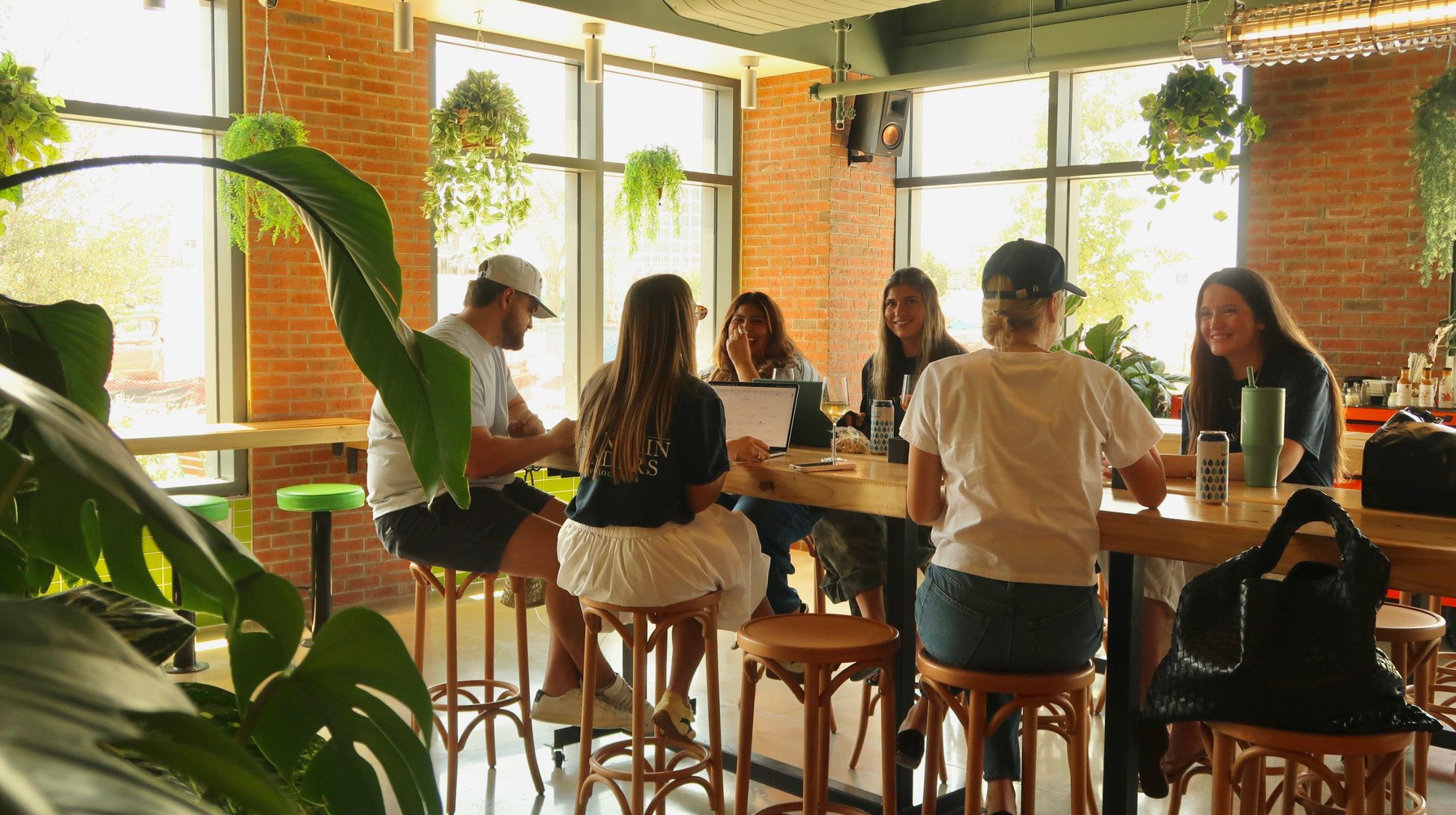 The Franklin Finders team working together at a coffee shop